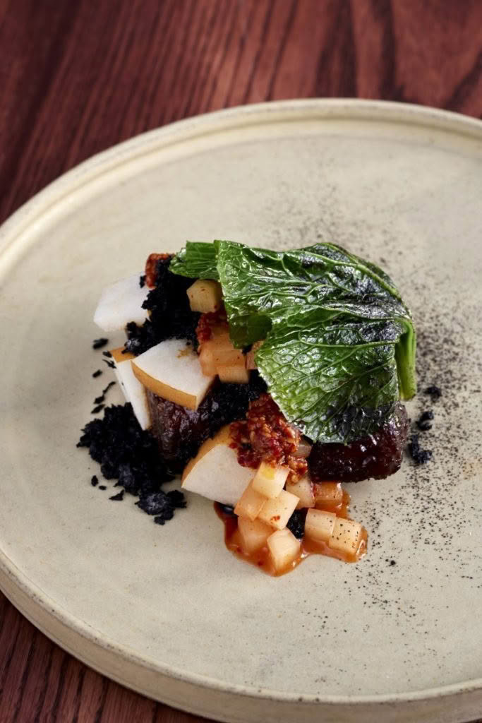 Anise Main_Wagyu beef galbi, kimchi, black garlic, nashi pear credit Babiche Martens 17