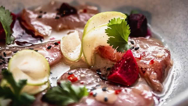 Cuisine-Good-Food-Guide-2024-The-Bistro-Dry-age-raw-Hapuka,-sichuan-pickled-green-apple,-smoked-kina-emulsion