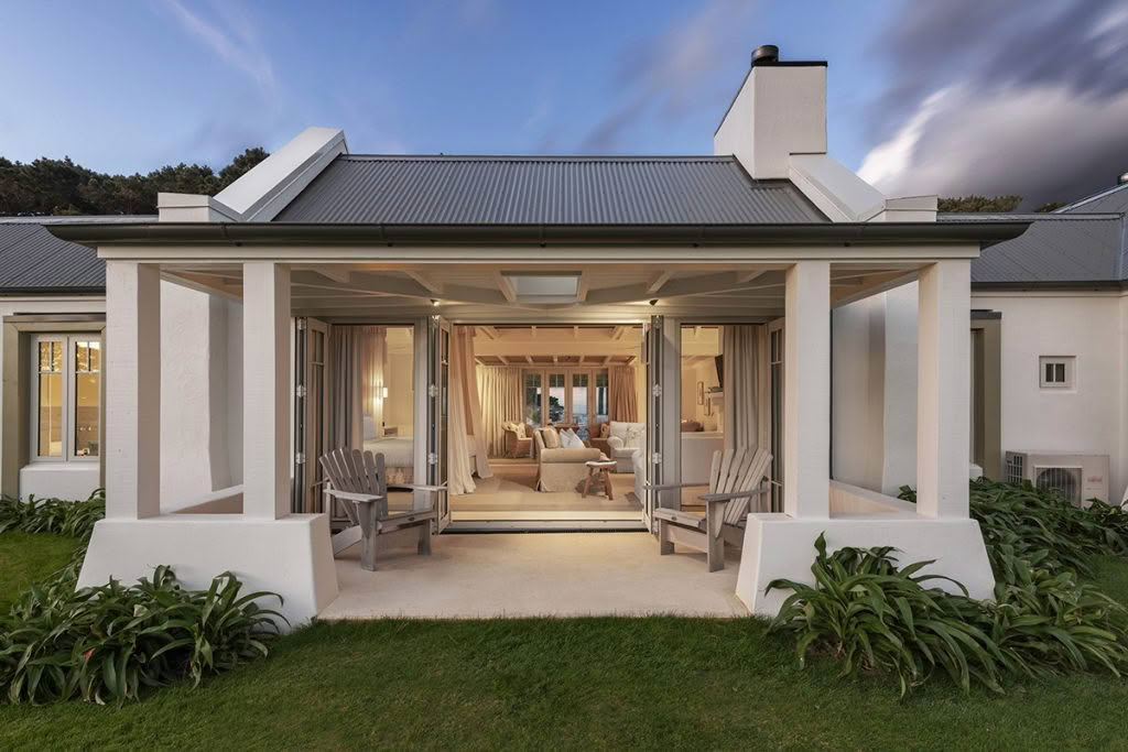 Cuisine-Good-Food-Guide-2024-Wharekauhau-Country-Estate-Back-cottage-terrace