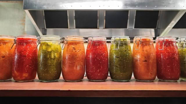 Cuisine Good Food Guide 2025 Hawker House & Bar sauces made from the freshly picked chillies grown by us