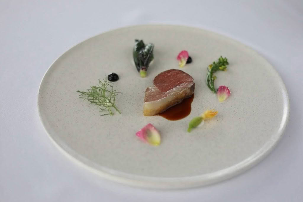Cuisine-Good-Food-Guide-2024-The-Chefs-Table-Orianna-Photography-Station-lamb-with-Spring-greens-and-pickled-rose.jpg