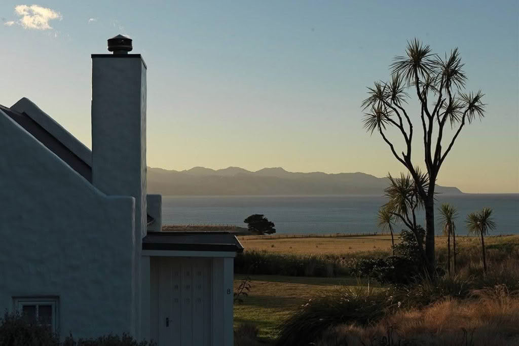 Cuisine-Good-Food-Guide-2024-Wharekauhau-Country-Estate-Cottage-view.jpg