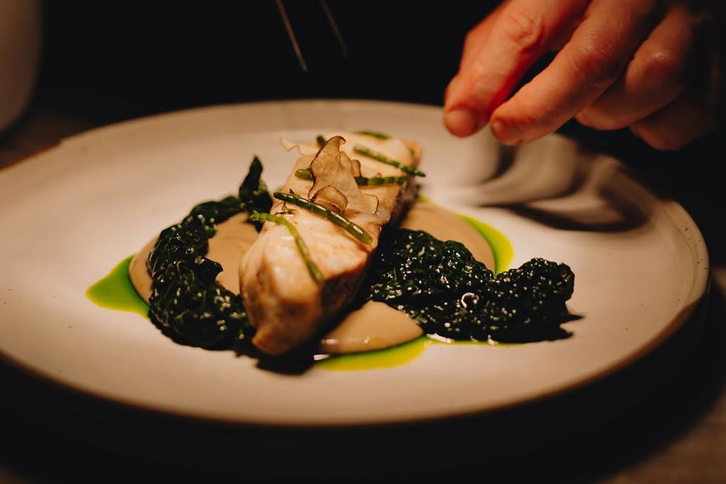 Cuisine-Good-Faood-Guide-2026-The-Wine-Room-by-David-Nash-Sonna-Studios-crop