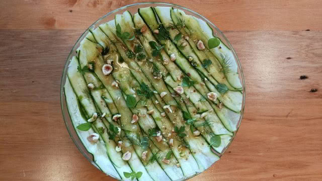 Cuisine Good Food Guide 2026 Graze Zucchini with parsley and fennel yoghurt topped with hazelnuts, herbs and fig leaf oil – Photo credit Stina Persen
