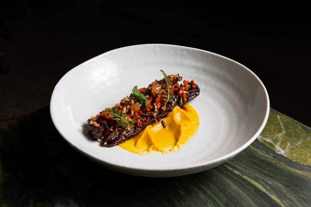 Cuisine Good Food Guide 2026 Inati to Share EARTH_ Smoked rehydrated carrot, black rice & ginger credit Jerome Warburton