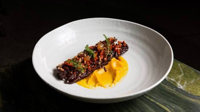 Cuisine Good Food Guide 2026 Inati to Share EARTH_ Smoked rehydrated carrot, black rice & ginger credit Jerome Warburton