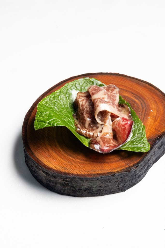 Cuisine Good Food Guide 2026 Inati to Share LAND_ 100 day added Black Origin Wagyu beef, charcoal burnt wagyu fat, wasabi & horseradish credit Jerome Warbuton