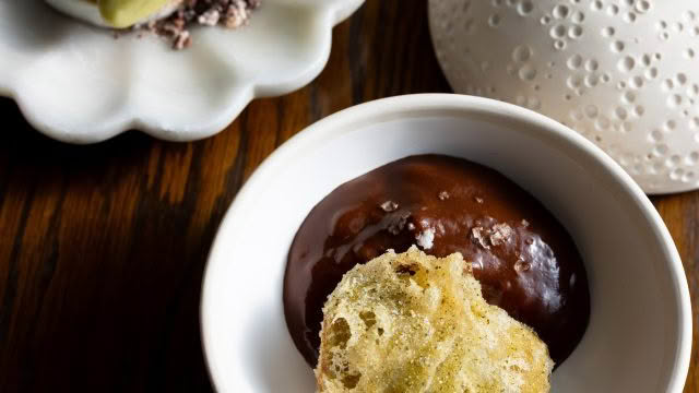 Cuisine Good Food Guide 2026 Inati to Share NECTAR_ Fried feijoa, dark chocolate, Italian meringue & sherbet, credit Jerome Warburton