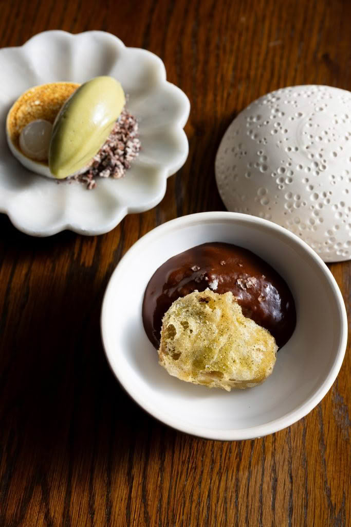 Cuisine Good Food Guide 2026 Inati to Share NECTAR_ Fried feijoa, dark chocolate, Italian meringue & sherbet, credit Jerome Warburton