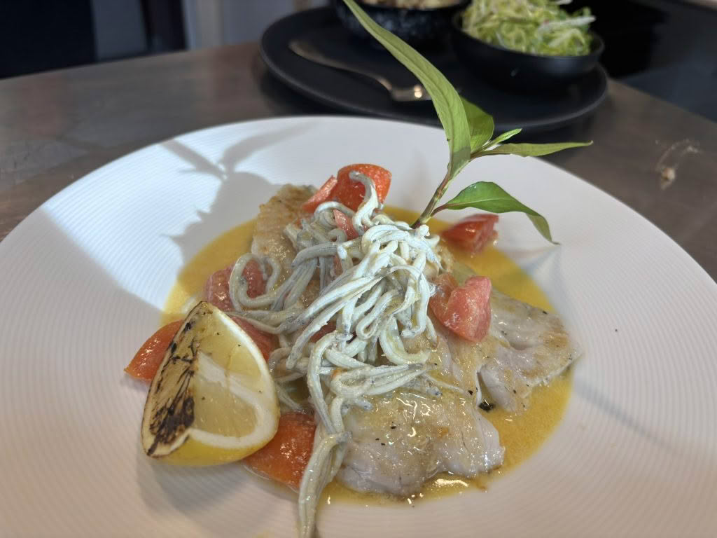 Cuisine Good Food Guide 2026 Top Sail’s Beach Road Brasserie TopSail BRB Fresh schnapper grilled with SI whitebait tomato champagne butter sauce